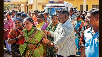 Family members of the victims mourn outside a mortuary in Hubballi on Tuesday. (PTI) Family members of the victims mourn outside a mortuary in Hubballi on Tuesday. (PTI)