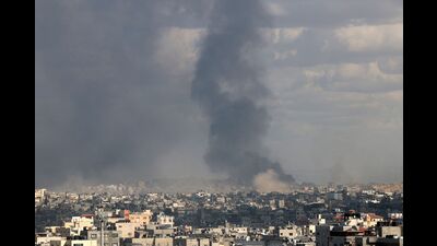TOPSHOT - This picture taken from Gaza City shows smoke billowing after an Israeli strike in the north of the Palestinian territory on December 29, 2024, amid the ongoing war between Israel and the Palestinian Hamas movement. (Photo by Omar AL-QATTAA / AFP) (AFP) TOPSHOT - This picture taken from Gaza City shows smoke billowing after an Israeli strike in the north of the Palestinian territory on December 29, 2024, amid the ongoing war between Israel and the Palestinian Hamas movement. (Photo by Omar AL-QATTAA / AFP) (AFP)