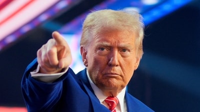 Donald Trump, during his campaign trial. pledged to take over additional powers as president and overhaul the US government (REUTERS)
