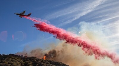A firefighter aircraft drops fire retardant near Malibu, California. The wildfire scorched over 2800 acres near Pepperdine University prompting evacuations along the coast amid high winds with some homes destroyed. (AFP) A firefighter aircraft drops fire retardant near Malibu, California. The wildfire scorched over 2800 acres near Pepperdine University prompting evacuations along the coast amid high winds with some homes destroyed. (AFP)
