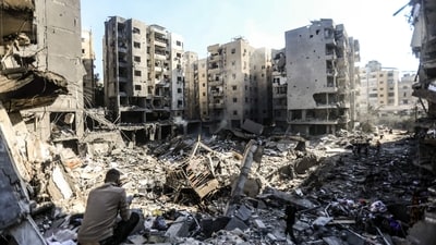 People look through the rubble of buildings which were levelled on September 27 by Israeli strikes that targeted and killed Hezbollah leader Hassan Nasrallah, in the Haret Hreik neighbourhood of Beirut's southern suburbs, on September 29, 2024. Israel killed Hezbollah chief Hassan Nasrallah in a huge air strike in Lebanon, dealing the movement a seismic blow that Prime Minister Benjamin Netanyahu on September 28 called a "turning point" for his country. (AFP) People look through the rubble of buildings which were levelled on September 27 by Israeli strikes that targeted and killed Hezbollah leader Hassan Nasrallah, in the Haret Hreik neighbourhood of Beirut's southern suburbs, on September 29, 2024. Israel killed Hezbollah chief Hassan Nasrallah in a huge air strike in Lebanon, dealing the movement a seismic blow that Prime Minister Benjamin Netanyahu on September 28 called a "turning point" for his country. (AFP)