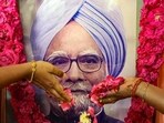 People pay tributes to former prime minister Manmohan Singh in Chennai on Friday. (PTI Photo)