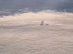 Doubts have been raised about the authenticity of a video showing 'figures' on cloud cover Doubts have been raised about the authenticity of a video showing 'figures' on cloud cover