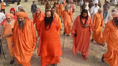 Akhil Bharatiya Akhara Parishad President Mahant Ravindra Puri with Sadhus and administrative officers during inspection of the land allotted for setting up their tents for Mahakumbh Mela 2025. (ANI Photo) (Anand Prashad) Akhil Bharatiya Akhara Parishad President Mahant Ravindra Puri with Sadhus and administrative officers during inspection of the land allotted for setting up their tents for Mahakumbh Mela 2025. (ANI Photo) (Anand Prashad)