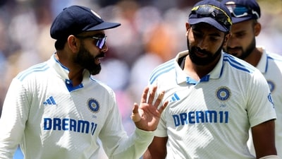 India's Virat Kohli (L) chats to Jasprit Bumrah as they leave the field for the lunch break on day four of the fourth cricket Test match between Australia and India at the Melbourne Cricket Ground (MCG) (AFP) India's Virat Kohli (L) chats to Jasprit Bumrah as they leave the field for the lunch break on day four of the fourth cricket Test match between Australia and India at the Melbourne Cricket Ground (MCG) (AFP)