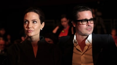 Famed actors Brad Pitt and Angelina Jolie signed off on a divorce settlement on December 30, 2024, according to People Magazine, marking a turning point in the eight-year legal saga. (Photo by CARL COURT / AFP) Famed actors Brad Pitt and Angelina Jolie signed off on a divorce settlement on December 30, 2024, according to People Magazine, marking a turning point in the eight-year legal saga. (Photo by CARL COURT / AFP)