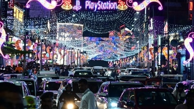 Bengaluru's Brigade road is lit up during the New Year celebrations. Bengaluru's Brigade road is lit up during the New Year celebrations.