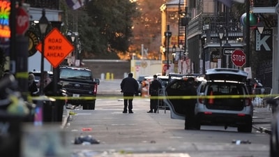 Emergency services attend the scene after a vehicle drove into a crowd on New Orleans' Canal and Bourbon Street, Wednesday Jan. 1, 2025. (AP Photo/Gerald Herbert) (AP)