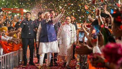 Prime Minister Narendra Modi and BJP National President JP Nadda greet supporters upon their arrival for a meeting at the party headquarters as the party leads in the Lok Sabha elections amid the counting of votes, in New Delhi, June 4, 2024. (PTI/Manvender Vashist Lav) Prime Minister Narendra Modi and BJP National President JP Nadda greet supporters upon their arrival for a meeting at the party headquarters as the party leads in the Lok Sabha elections amid the counting of votes, in New Delhi, June 4, 2024. (PTI/Manvender Vashist Lav)