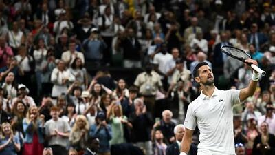 Serbia's Novak Djokovic celebrates winning against Denmark's Holger Rune during their men's singles tennis match on the eighth day of the 2024 Wimbledon Championships at The All England Lawn Tennis and Croquet Club in Wimbledon on July 8. (AFP) Serbia's Novak Djokovic celebrates winning against Denmark's Holger Rune during their men's singles tennis match on the eighth day of the 2024 Wimbledon Championships at The All England Lawn Tennis and Croquet Club in Wimbledon on July 8. (AFP)