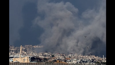Smoke rises from an Israeli strike as the Israeli military conducts operations inside the Gaza Strip, amid the ongoing conflict between Israel and Hamas, as seen from southern Israel, January 1, 2025. REUTERS/Kai Pfaffenbach TPX IMAGES OF THE DAY (REUTERS) Smoke rises from an Israeli strike as the Israeli military conducts operations inside the Gaza Strip, amid the ongoing conflict between Israel and Hamas, as seen from southern Israel, January 1, 2025. REUTERS/Kai Pfaffenbach TPX IMAGES OF THE DAY (REUTERS)