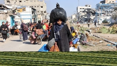 Palestinians displaced amid the ongoing conflict in the Gaza Strip between Israel and terrorist group Hamas, take shelter in tents set up at Palestine Stadium in Gaza City, on November 9, 2024. (AFP/Omar Al-Qattaa)