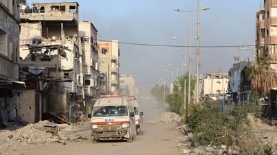 Ambulances transport wounded Palestinians from the Kamal Adwan Hospital to the al-Shifa hospital in Gaza City, on December 28, 2024. Gaza health officials said on December 28, that Israeli forces detained the director of a hospital in the north, which the World Health Organization said was put out of service by an Israeli raid.&nbsp; (AFP/Omar Al-Qattaa)