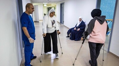 Palestinian girls who were injured in the Gaza Strip during the war between Israel and Hamas, receive rehabitation care at a hospital in Abu Dhabi (AFP) Palestinian girls who were injured in the Gaza Strip during the war between Israel and Hamas, receive rehabitation care at a hospital in Abu Dhabi (AFP)