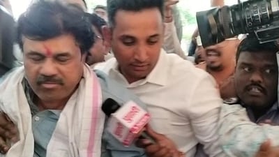 Walmik Karad surrendered at State Criminal Investigation (CID) department in Pune on Tuesday morning in case pertaining to extortion bid. (HT) Walmik Karad surrendered at State Criminal Investigation (CID) department in Pune on Tuesday morning in case pertaining to extortion bid. (HT)
