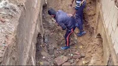 Workers during excavation work at a site in Sambhal district (PTI)