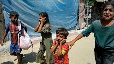 Palestinian children are evacuated from a site hit by an Israeli bombardment on Khan Younis, southern Gaza Strip, July 13, 2024.&nbsp; (AP/Jehad Alshrafi)