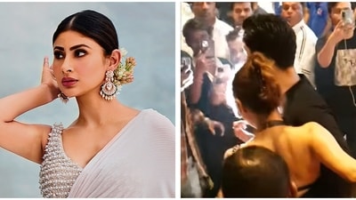 Mouni Roy looked unfazed as she got up and went towards her car, surrounded by paparazzi. Mouni Roy looked unfazed as she got up and went towards her car, surrounded by paparazzi.