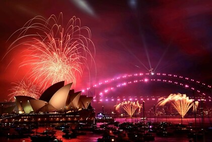 The 9pm fireworks are seen during New Year's Eve celebrations in Sydney, Australia, Tuesday, (AP) The 9pm fireworks are seen during New Year's Eve celebrations in Sydney, Australia, Tuesday, (AP)