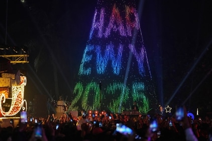 People attend New Year’s Eve celebrations in Mumbai on December 31, 2024. (REUTERS)
