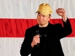 FILE PHOTO: Tesla CEO and X owner Elon Musk, who supports Republican presidential nominee Donald Trump, gestures as he speaks about voting during an America PAC Town Hall in Folsom, Pennsylvania, U.S., October 17, 2024. REUTERS/Rachel Wisniewski/File Photo