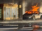 Flames rise from a Tesla Cybertruck after it exploded outside the Trump International Hotel Las Vegas, in Las Vegas, Nevada, U.S., January 1, 2025 in this screengrab taken from a social media video. 