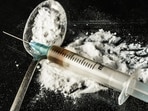  Hidden stash of 3.5 grams of hydro ganja, 130 grams of charas, 40 LSD strips, and 2.3 grams of MDMA was found during residence.