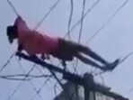 After a dispute over his mother's pension, the intoxicated man climbed an electric pole and fell asleep on the wires. After a dispute over his mother's pension, the intoxicated man climbed an electric pole and fell asleep on the wires.