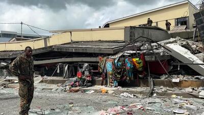 A security personnel stands next to a collapsed building in Vanuatu's capital Port Vila after a powerful 7.3-magnitude earthquake hit the Pacific island on December 17. (AFP Photo) A security personnel stands next to a collapsed building in Vanuatu's capital Port Vila after a powerful 7.3-magnitude earthquake hit the Pacific island on December 17. (AFP Photo)