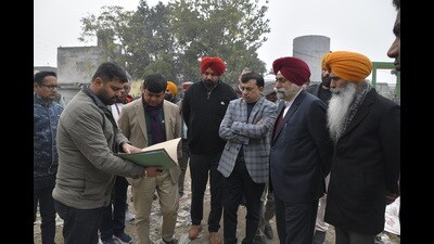 A team of officials from the Centre and the state during an inspection of several key locations along the Budhha Nullah in Ludhiana on Thursday. (Manish/HT) A team of officials from the Centre and the state during an inspection of several key locations along the Budhha Nullah in Ludhiana on Thursday. (Manish/HT)