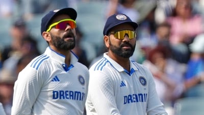 India's captain Rohit Sharma, right, and teammate Virat Kohli (AP) India's captain Rohit Sharma, right, and teammate Virat Kohli (AP)