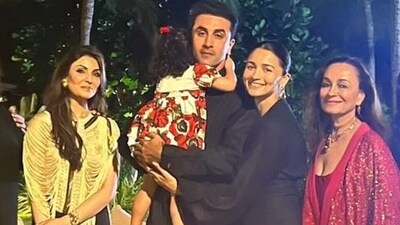 Ranbir Kapoor, Raha Kapoor and Alia Bhatt pose with their family. Ranbir Kapoor, Raha Kapoor and Alia Bhatt pose with their family.