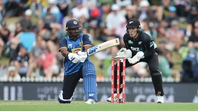 Sri Lanka's Kusal Perera (L) plays a shot as New Zealand wicketkeeper Mitch Hay looks on during the third Twenty20 cricket match (AFP) Sri Lanka's Kusal Perera (L) plays a shot as New Zealand wicketkeeper Mitch Hay looks on during the third Twenty20 cricket match (AFP)