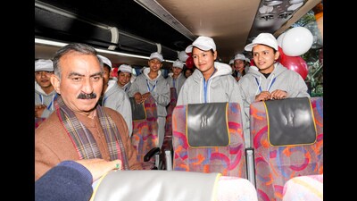 Himachal chief minister Sukhvinder Singh Sukhu with 22 children during the flag-off ceremony under in Shimla on Thursday. (ANI)