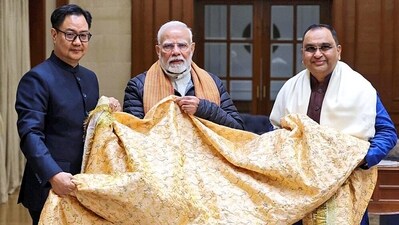 New Delhi, Jan 02 (ANI): Prime Minister Narendra Modi hands over a ceremonial 'Chadar' to Union Minister of Parliamentary Affairs Kiren Rijiju and BJP Minority Morcha President Jamal Siddiqui to be offered on his behalf at Ajmer Sharif Dargah on the occasion of 813th Urs of Khwaja Moinuddin Chisti, in New Delhi on Thursday. (ANI Photo) (Kiren Rijiju - X)