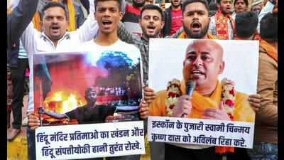 People in India protest against the arrest of Hindu monk Chinmoy Krishna Das in Bangladesh. (PTI Photo) People in India protest against the arrest of Hindu monk Chinmoy Krishna Das in Bangladesh. (PTI Photo)