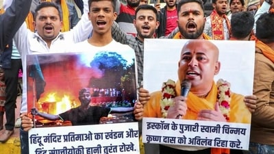 People in India protest against the arrest of Hindu monk Chinmoy Krishna Das in Bangladesh. (PTI Photo) People in India protest against the arrest of Hindu monk Chinmoy Krishna Das in Bangladesh. (PTI Photo)