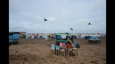 Street food vendor waits for customers at Marina beach in Chennai, India, Wednesday, Oct. 16, 2024. (AP Photo/Mahesh Kumar A.) (AP) Street food vendor waits for customers at Marina beach in Chennai, India, Wednesday, Oct. 16, 2024. (AP Photo/Mahesh Kumar A.) (AP)
