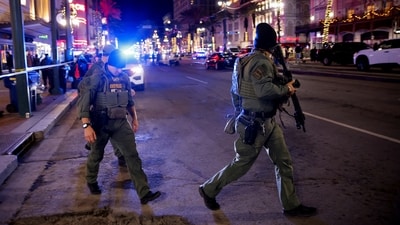 Police patrol the area near the scene where a vehicle drove into a crowd during New Year's celebrations, in New Orleans, Louisiana. (Reuters)