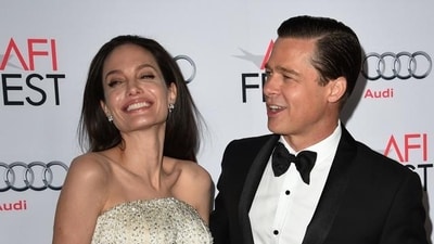 This file photo taken on November 5, 2015 shows Angelina Jolie Pitt (L) and estranged husband Brad Pitt arriving for the opening night gala premiere of Universal Pictures' By the Sea . (AFP) This file photo taken on November 5, 2015 shows Angelina Jolie Pitt (L) and estranged husband Brad Pitt arriving for the opening night gala premiere of Universal Pictures' By the Sea . (AFP)