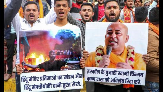 People in India protest against the arrest of Hindu monk Chinmoy Krishna Das in Bangladesh. (PTI Photo)