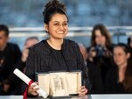 FILE -Payal Kapadia, winner of the grand prize for "All We Imagine as Light," poses after the awards ceremony at the 77th international film festival, Cannes. (Photo by Scott A Garfitt/Invision/AP, File) FILE -Payal Kapadia, winner of the grand prize for "All We Imagine as Light," poses after the awards ceremony at the 77th international film festival, Cannes. (Photo by Scott A Garfitt/Invision/AP, File)