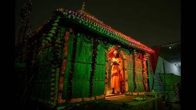 A Sadhu reads a religious book during evening prayers at Atal Akhara camp, ahead of the Mahakumbh Mela festival (AFP) A Sadhu reads a religious book during evening prayers at Atal Akhara camp, ahead of the Mahakumbh Mela festival (AFP)