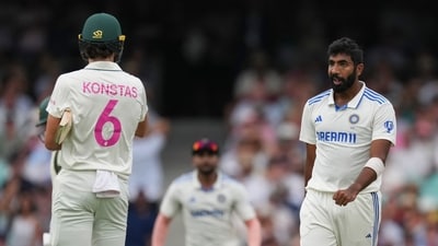 India's Jasprit Bumra, right, reacts with Australia's Sam Konstas, left, after taking the wicket of Australia's Usman Khawaja. (AP) India's Jasprit Bumra, right, reacts with Australia's Sam Konstas, left, after taking the wicket of Australia's Usman Khawaja. (AP)