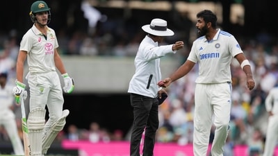 Umpire Sharfuddoula Saikat had to separate Sam Konstas and Jasprit Bumrah. (AP) Umpire Sharfuddoula Saikat had to separate Sam Konstas and Jasprit Bumrah. (AP)