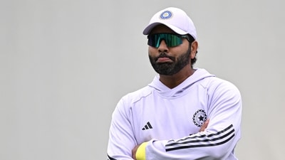 India's Rohit Sharma watches teammates during a practice session ahead of the fifth cricket Test match between Australia and India (AFP) India's Rohit Sharma watches teammates during a practice session ahead of the fifth cricket Test match between Australia and India (AFP)