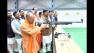 Chief minister Yogi Adityanath taking aim with a rifle during the inauguration of mini sports stadium in Gorakhpur on Friday. He impressed all present on the occasion with his marksmanship (HT Photo) Chief minister Yogi Adityanath taking aim with a rifle during the inauguration of mini sports stadium in Gorakhpur on Friday. He impressed all present on the occasion with his marksmanship (HT Photo)