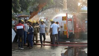 Firefighters at the spot after an LPG-filled tanker detached from a truck, leading to a gas leak, in Coimbatore district, Tamil Nadu, on Friday. (PTI) Firefighters at the spot after an LPG-filled tanker detached from a truck, leading to a gas leak, in Coimbatore district, Tamil Nadu, on Friday. (PTI)