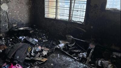 Firefighters evacuated about 50 residents from flat on the fifth and the seventh floors, bringing them to the corridors. (HT PHOTO)