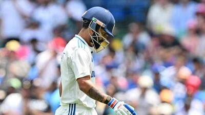 Virat Kohli walks back after his dismissal on Day 1 of Sydney Test on Friday. (AFP) Virat Kohli walks back after his dismissal on Day 1 of Sydney Test on Friday. (AFP)